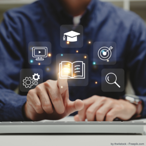 Verschiedene Icons schweben in der Luft vor einem Mann, er tippt mit der Hand auf das Icon mit einem Buch.